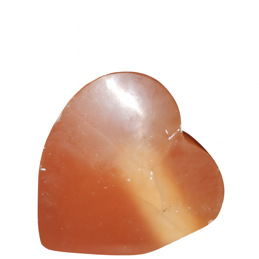 Heart-shaped stone on a white background
