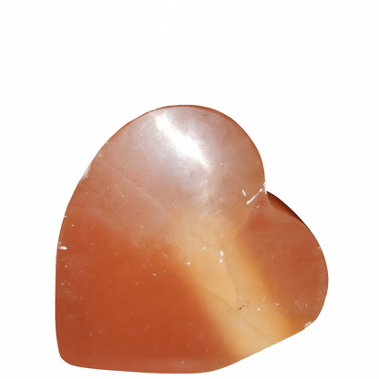 Heart-shaped stone on a white background