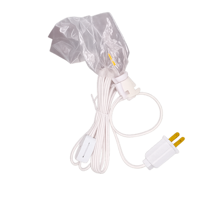 White electronic device with cable and plug on a white background