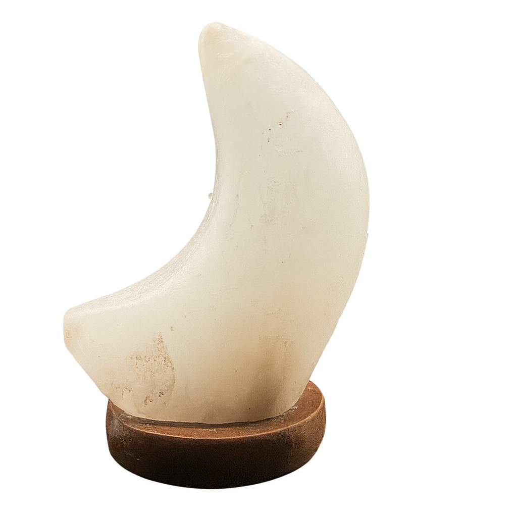 Decorative item resembling a crescent moon on a wooden base against a white background