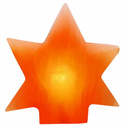 Star-shaped orange candle on a white background